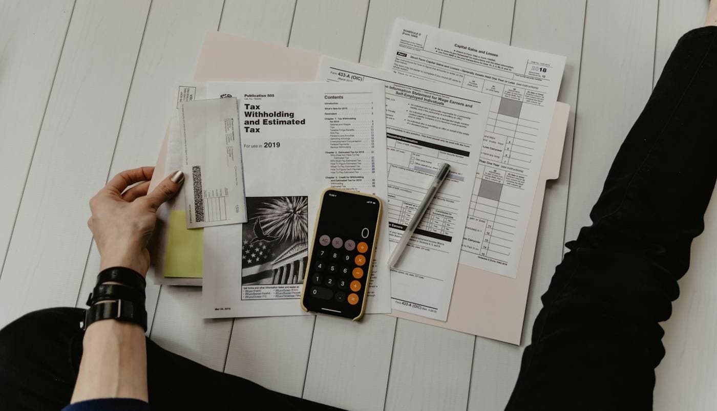 Paperwork and a calculator on a desk